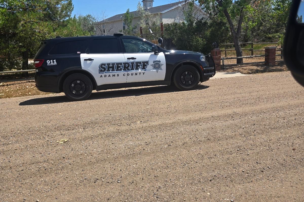 Adams County Sheriff on site for a sheriff-supervised eviction set-out
